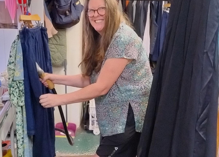KMS Tracy steaming clothes in backroom